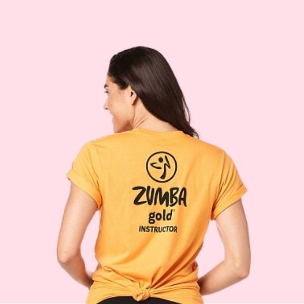women showing back of tshirt which says zumba gold